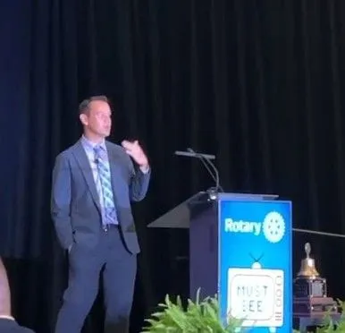 Charles speaking at Rotary International Assembly